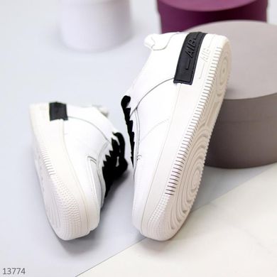 Женские спортивные кожаные кроссовки itts белого цвета с черными шнурками