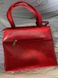Яркая красная удобная женская сумка