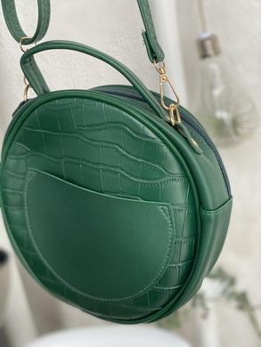 Круглая зеленая сумочка из эко кожи.
