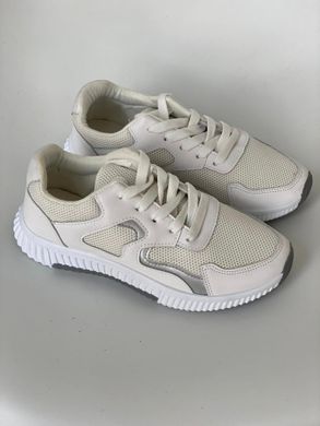 Cпортивні легкі кросівки білого кольору