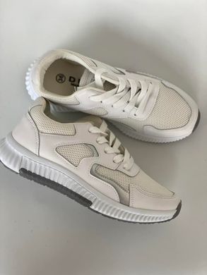 Cпортивні легкі кросівки білого кольору